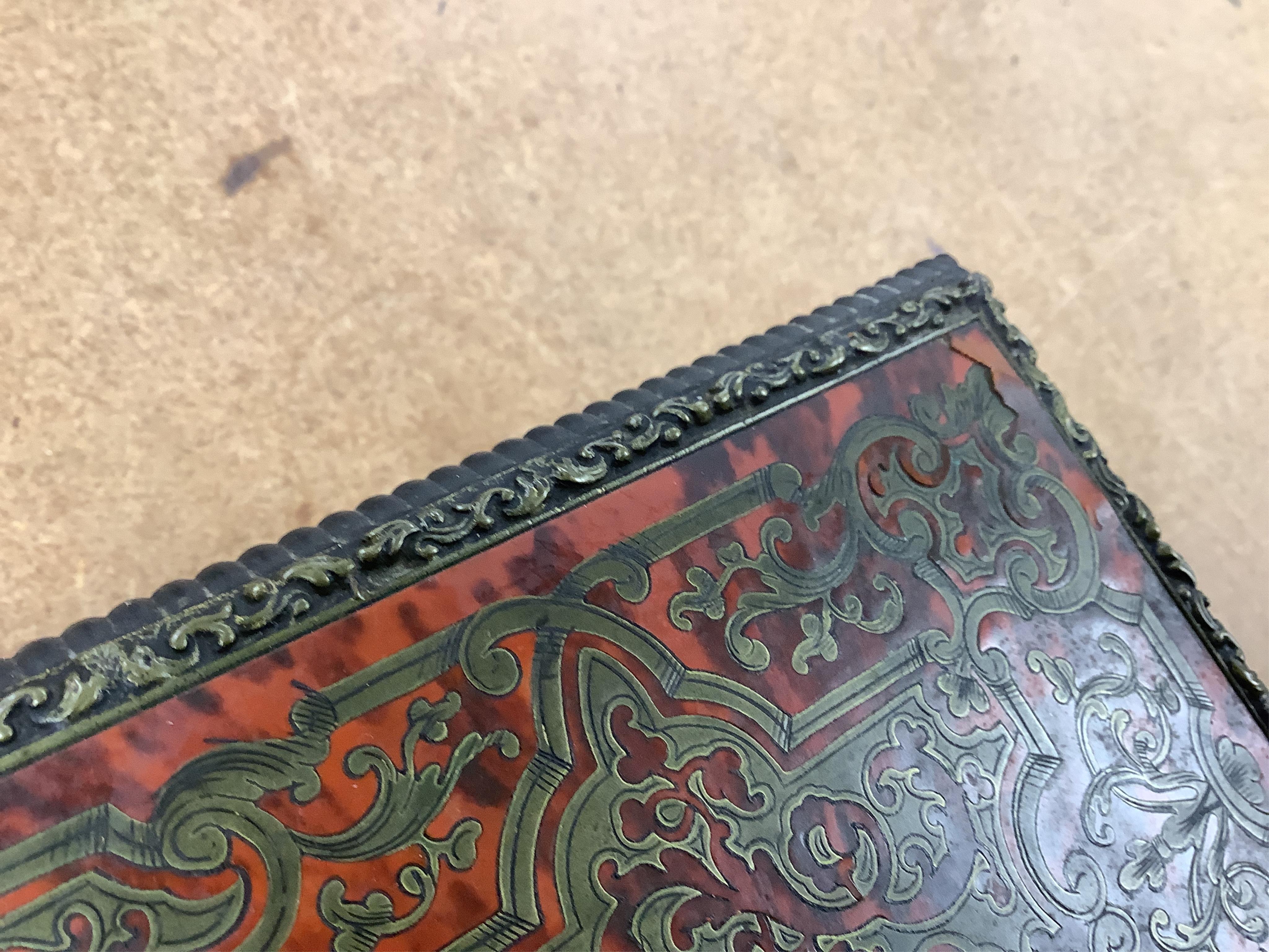 A 19th century French boullework glove box, signed Tahan, Rue de la Paix, width 27cm.